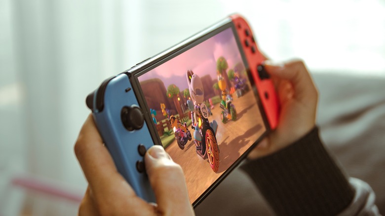 person playing game Nintendo Switch