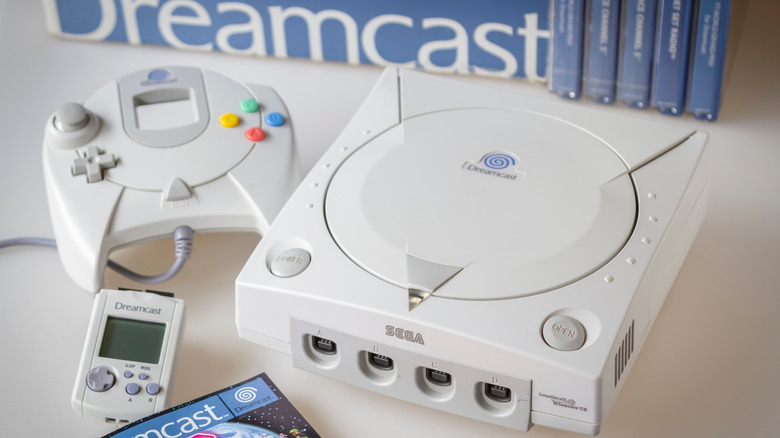 sega dreamcast with controller and games
