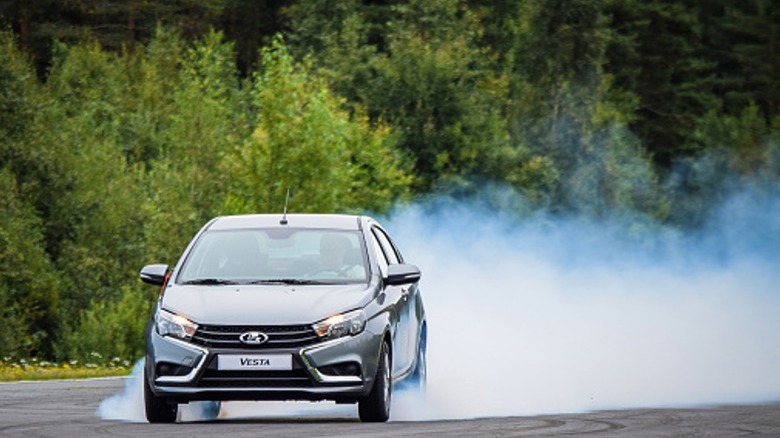 Smoke behind a car after hard braking