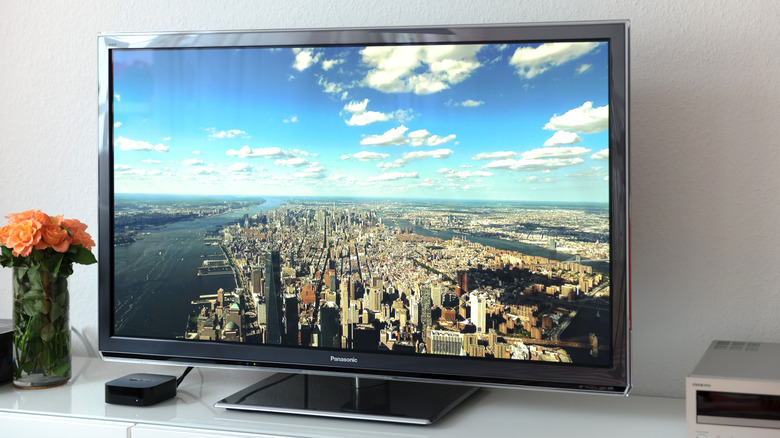 Apple aerial city screensaver on TV
