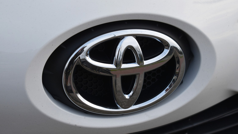 Toyota logo on a white 2021 Toyota Aygo