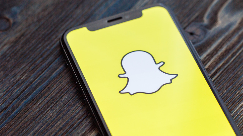 Snapchat logo on a phone