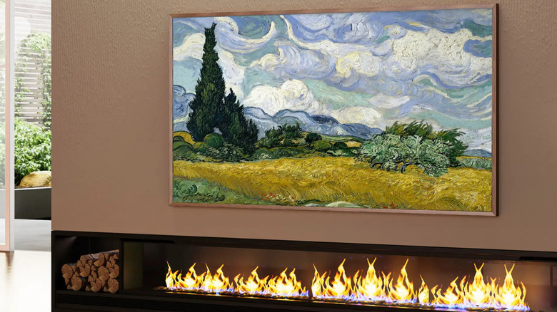 A Hisense Canvas S7 series TV above a fireplace.