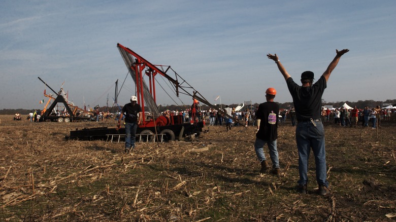 Many Pumpkin Launchers and an audience