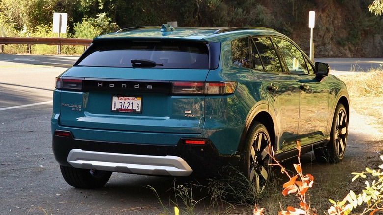 Blue Honda Prologue Elite parked