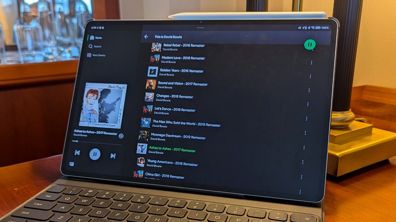 MagicPad2 playing spotify on desk