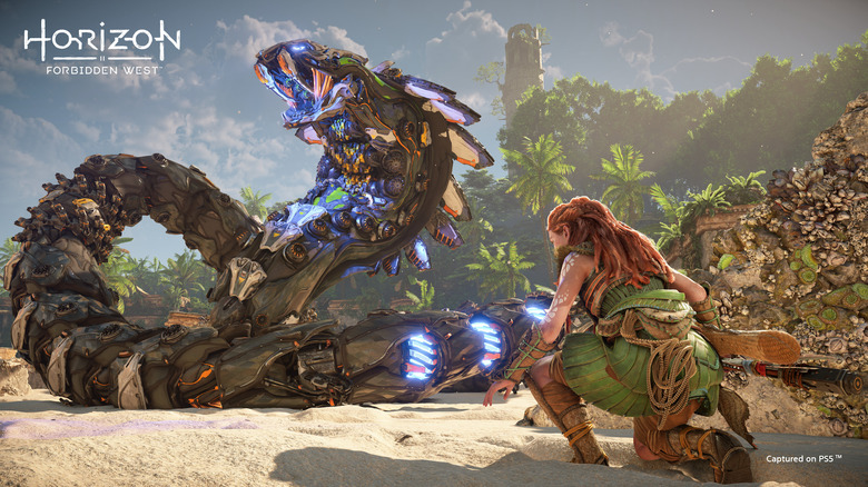 Aloy fighting a Slitherfang