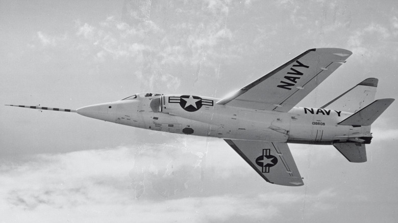 F11F-1 Tiger flying amidst clouds