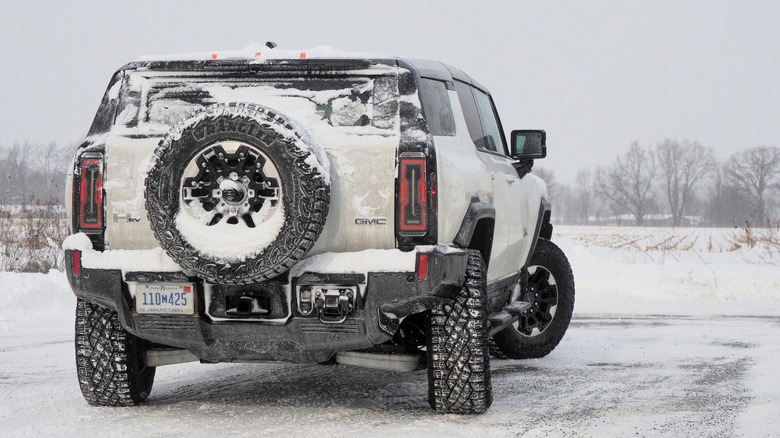 2025 Hummer EV 3X SUV rear view in snow