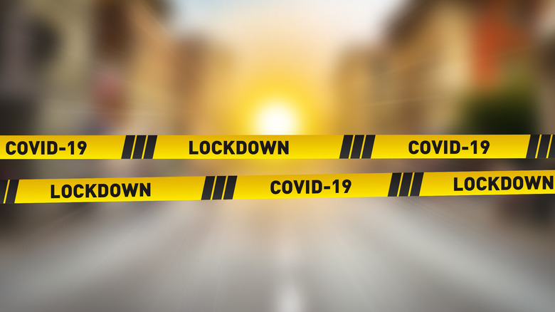 COVID lockdown sign warning tape