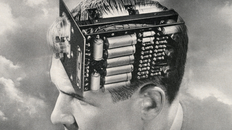 Vintage illustration of the head of a man with an electronic circuit board for a brain, 1949. Screen print.