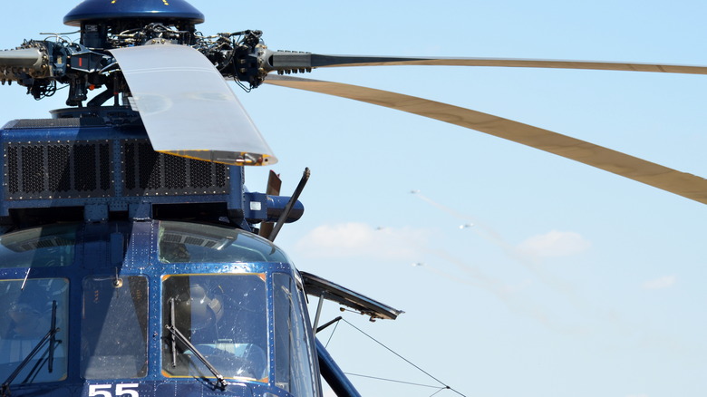 Helicopter cockpit and rotor blades