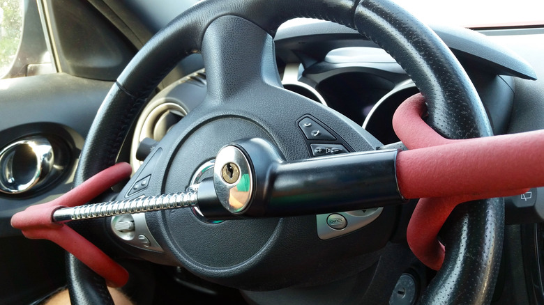 Steering wheel with red lock across it