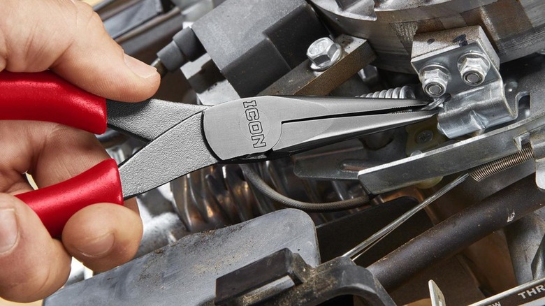 Person using Icon pliers