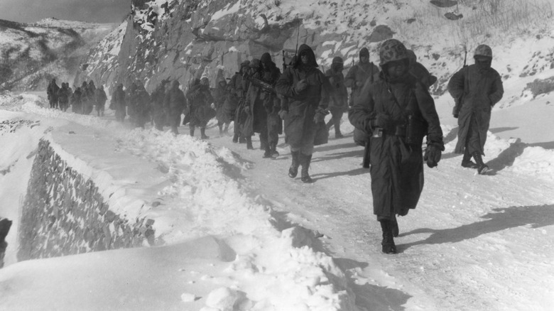 US troops marching in the snow during the Korean War