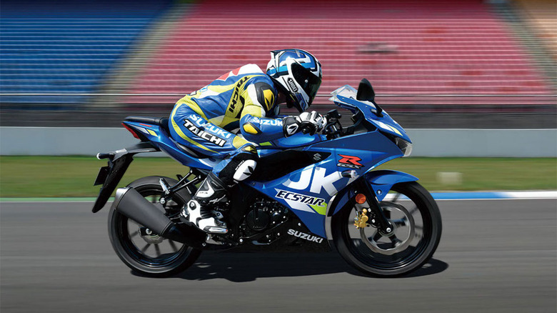 Suzuki GSX-R 125 blue motorcycle riding fast on the road