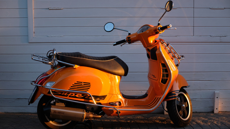 A Vespa GTS Super Sport parked