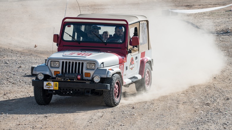 1987-1996 Jeep Wrangler in Jurassic Park livery off-road driving