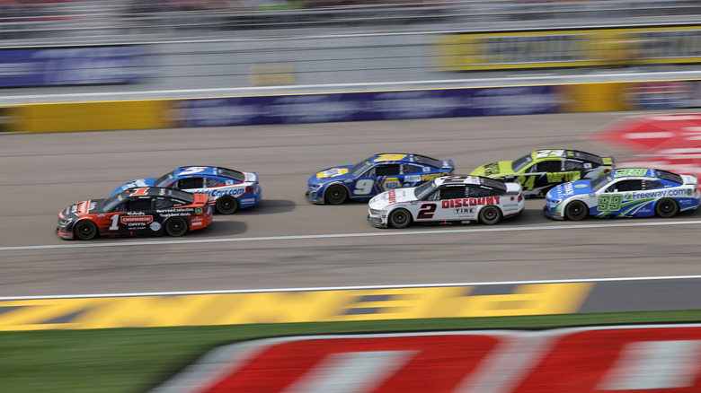 Cars race during the NASCAR Cup Series Pennzoil 400 at Las Vegas Motor Speedway on March 16, 2025 in Las Vegas, Nevada.