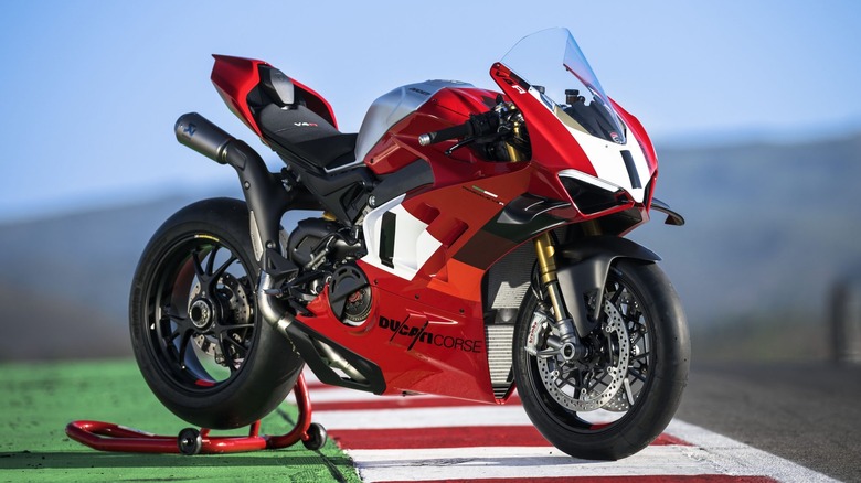 A red Ducati Panigale V4 on a track