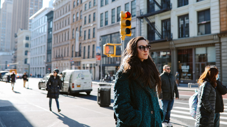 Woman walking along Manhattan street