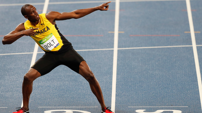 Usain Bolt posing after winning race