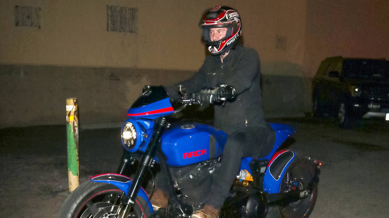 Keanu Reeves riding motorcycle