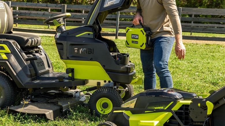 Ryobi 80V battery being installed 