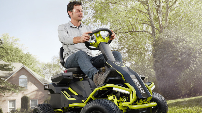 Person driving Ryobi RM480E