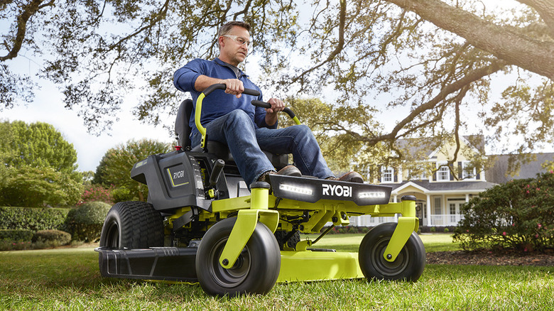 Person driving Ryobi ZT480ex