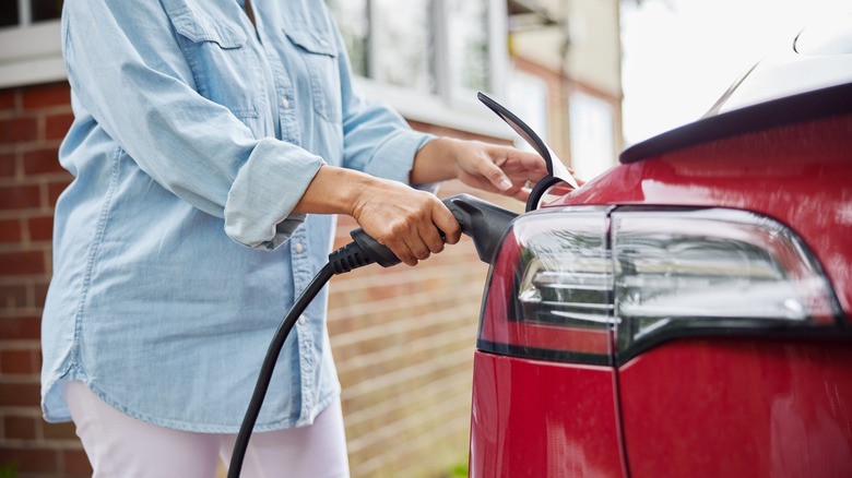 Plugging in electric vehicle