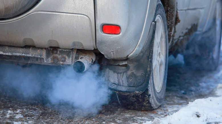 smoke from car exhaust in winter