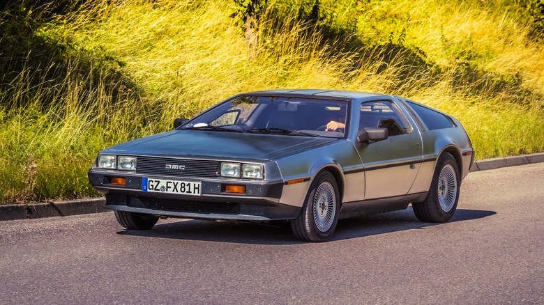 DeLorean DMC-12 driving on the road