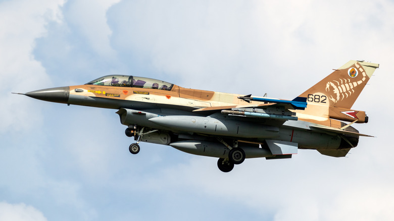 Israeli F-16 landing cloudy skies