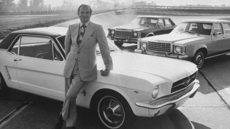 Lee Iacocca with first-generation Mustang