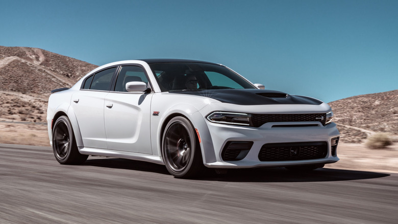 White 2023 Dodge Charger Scat Pack Widebody on desert road