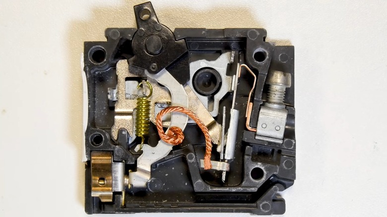 The Inside Of A Circuit Breaker With Internal Parts Visible