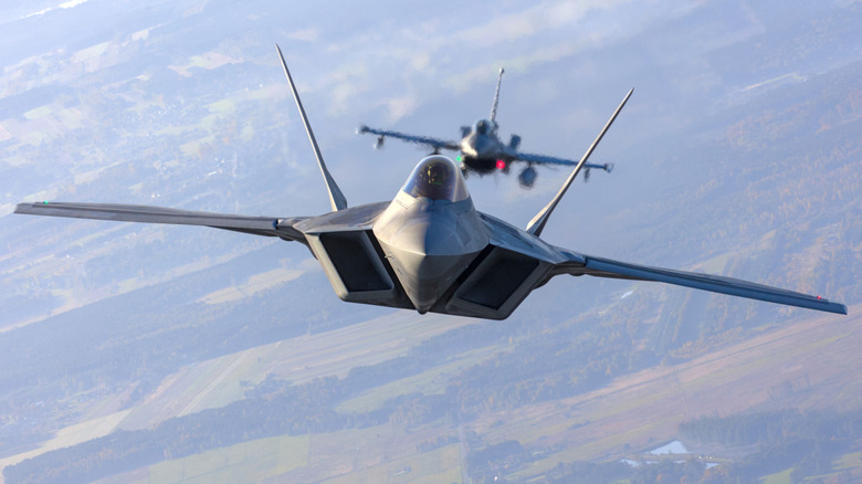 Two U.S. Air Force F-22 Raptor fighter jets overhead Poland