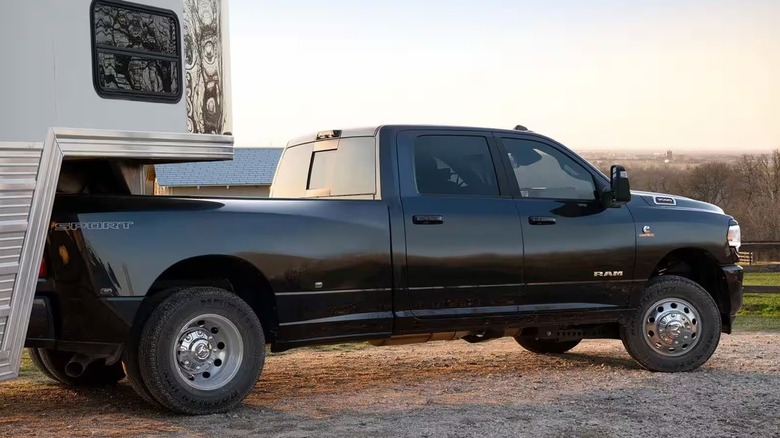 The 6.7 Cummins powered 2024 Ram 3500 parked with fifth wheel