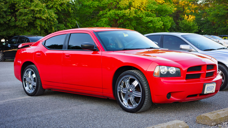 Red 2006 Dodge Charger parked