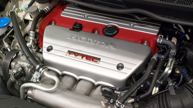 red and silver honda engine