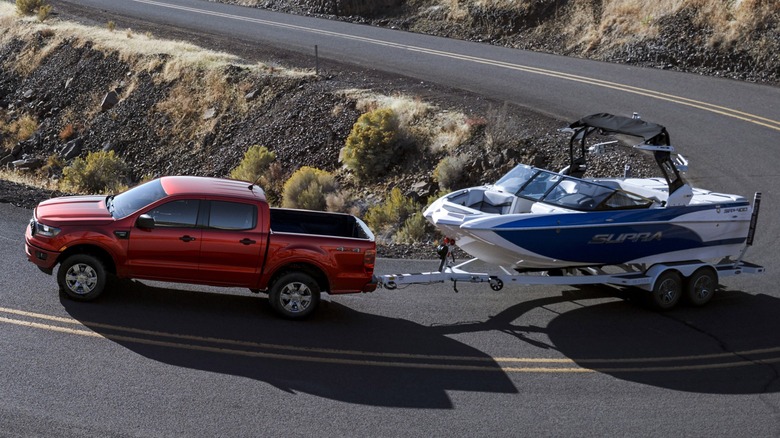 A 2019 Ford Ranger towing a boat.