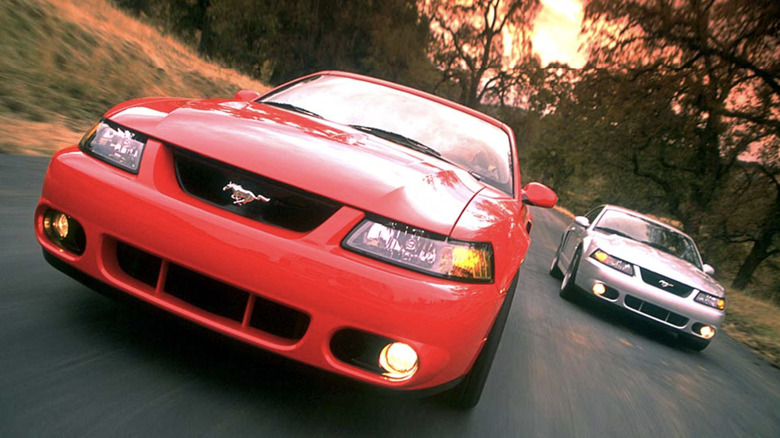 Red and silver 2003 Ford Mustang SVT Cobras