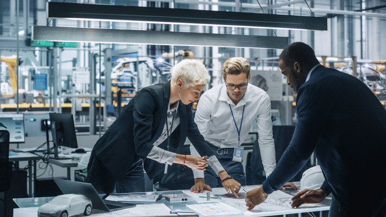 Engineers in an automobile factory 