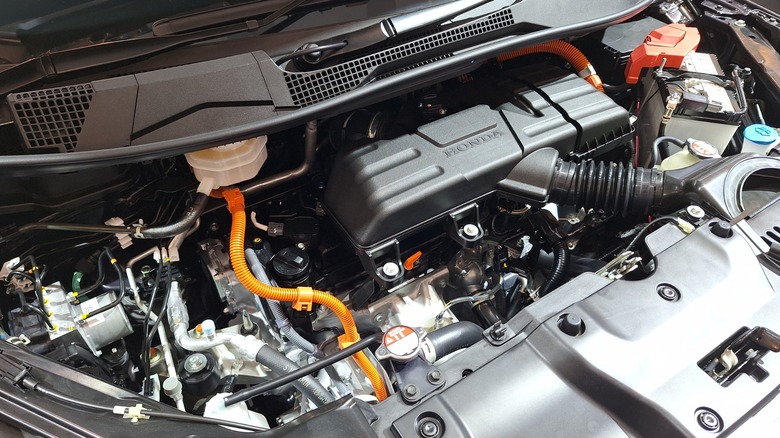 a honda hybrid engine in engine bay