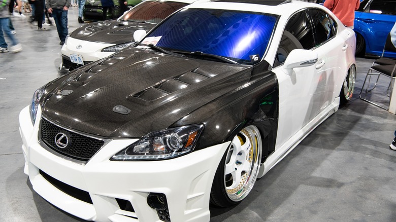 a lexus car with carbon fibre mods