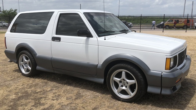 A white GMC Typhoon on display at RADwood in Austin, Texas.