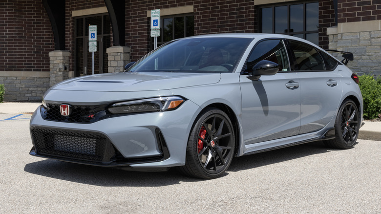 A gray 2024 Honda Civic Type R outside a building