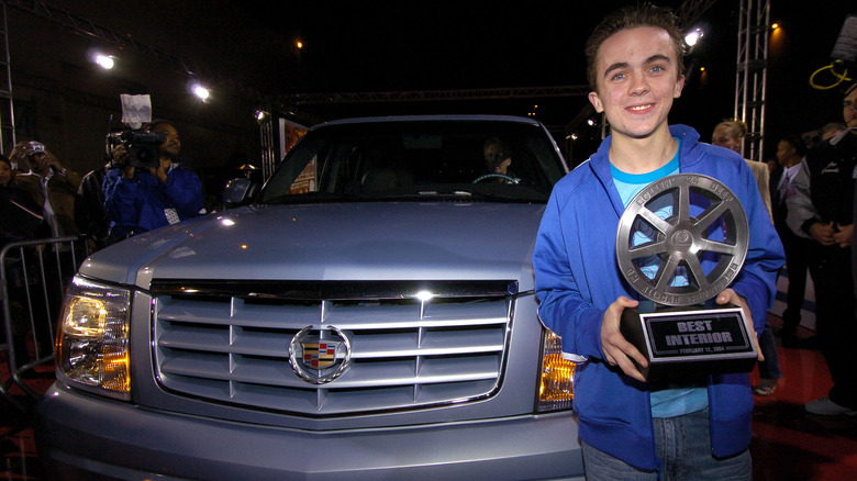 Frankie Muniz and 2002 Escalade