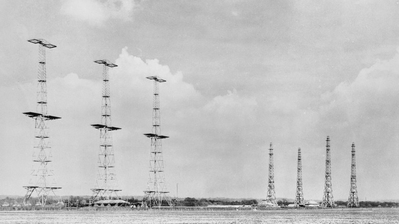 Seven radar towers in a row 